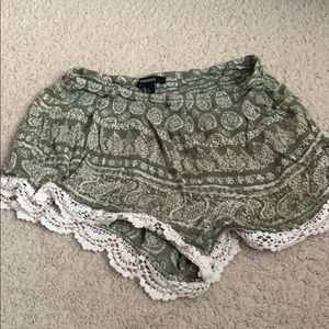 Forever 21 green flows shorts with lace trim